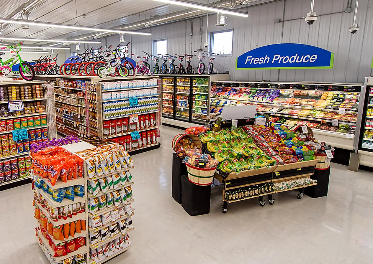 Aisles of grocery and Fresh Produce also shelves of salty snacks