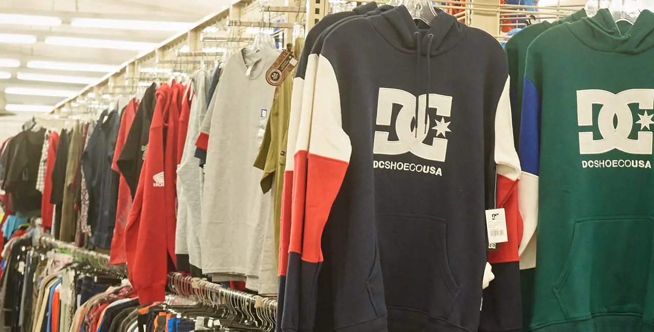 Full racks inside of a Northern with various clothing.